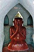 Bagan Myanmar. Shwezigon pagoda. The precinct is full of numerous images, inscribed bells, stone inscriptions and other paraphernalia.  